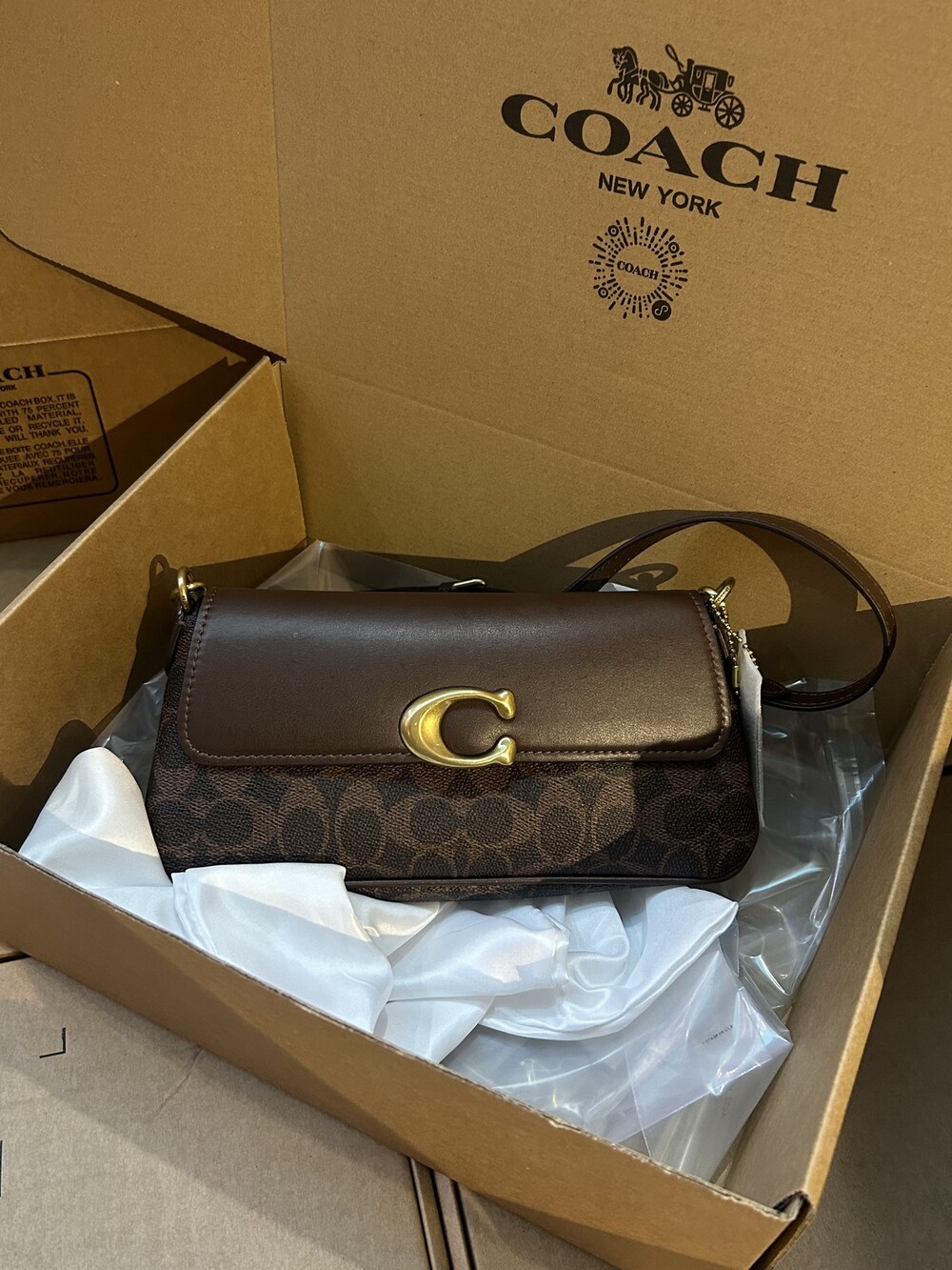 Coach brown baguette crossbody bag